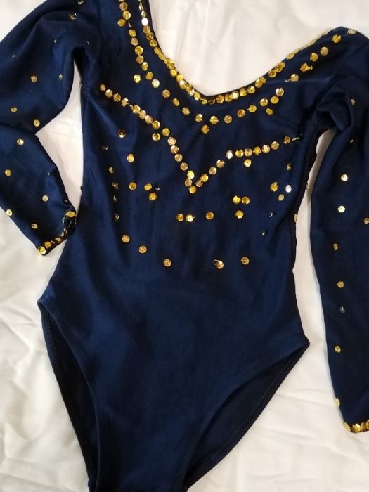 Продам спортивный купальник для девочки 6-8 лет