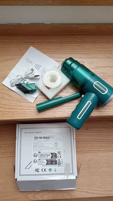 Mini aspirador portátil