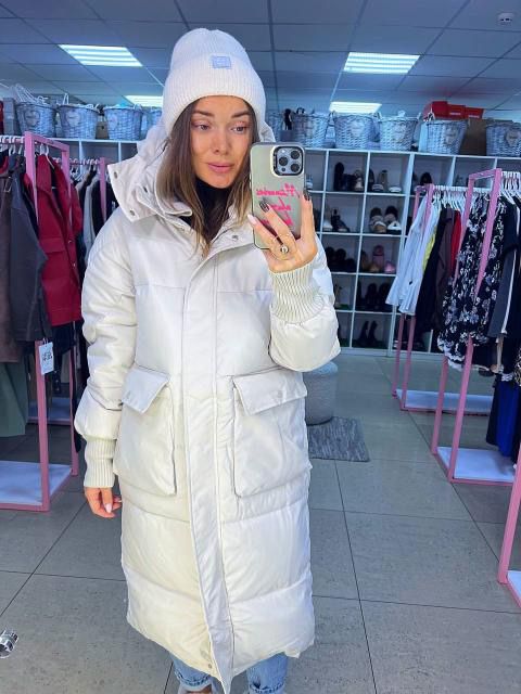 Пуховик в молочному кольорі