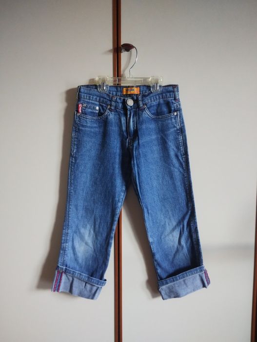 Spodnie jeansowe 3/4 na 140 cm