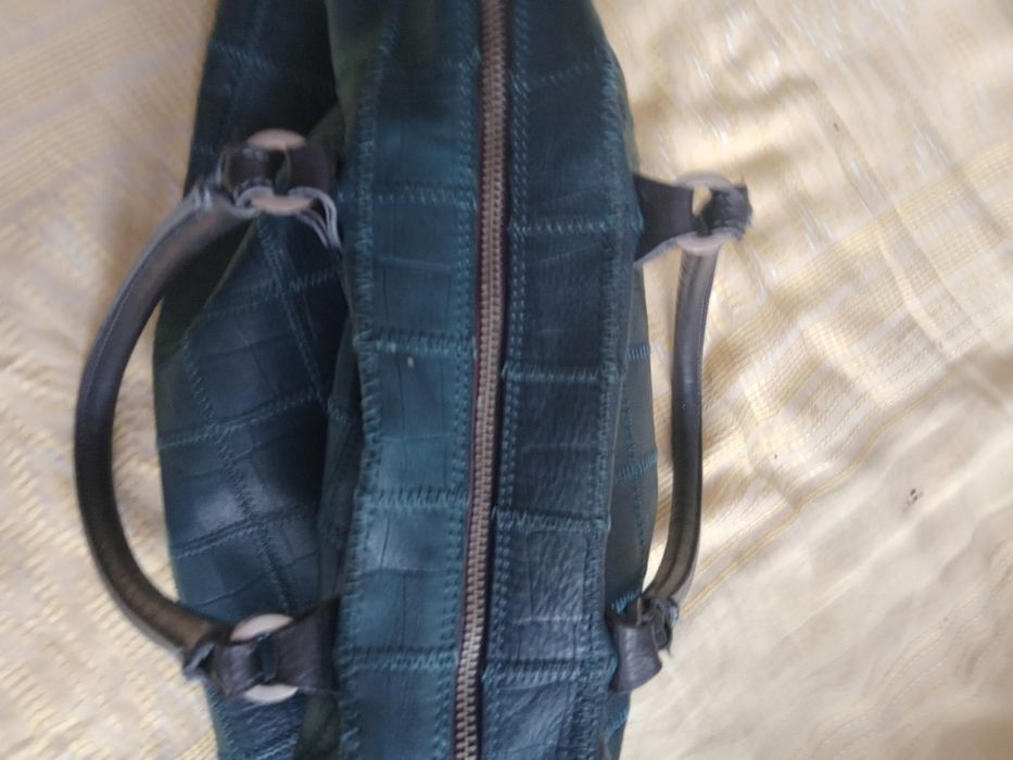 Продам  новые  кожанныее сумочки. И кожанний портфель