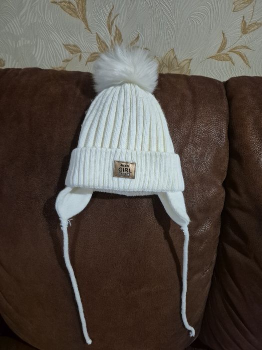 Шапочки на дівчинку