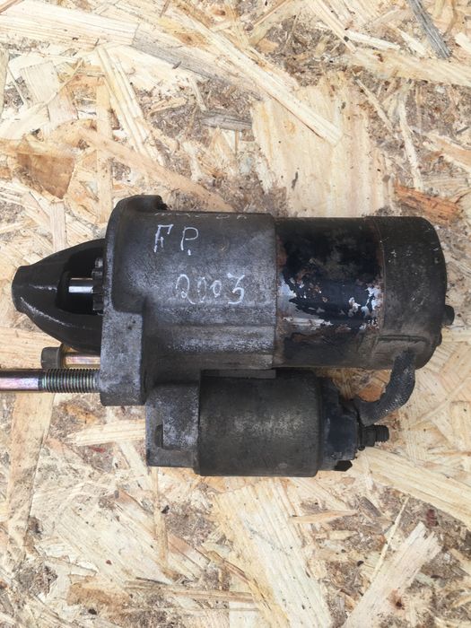 Стартер на мазду 323f 2003р