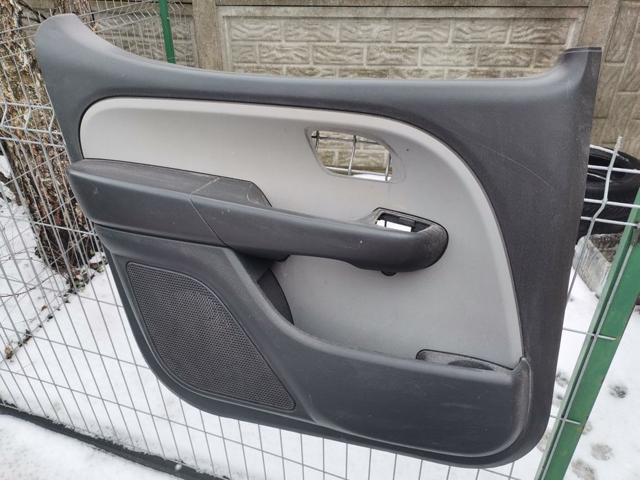 Boczek drzwi bocznych lewy przód Fiat Doblo I lift