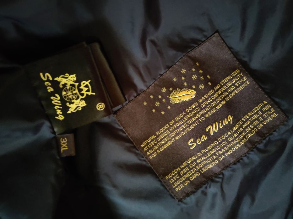 Натуральний пуховик 52р