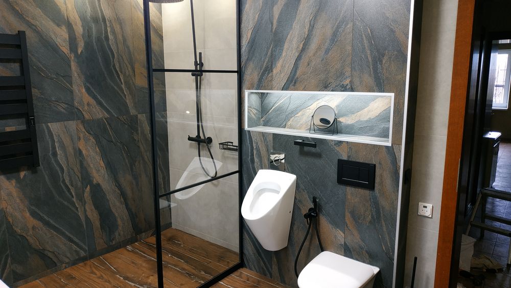 Встановлюваня душевих кабін,стікляних перегородок,сантехніка,вани,т.д.