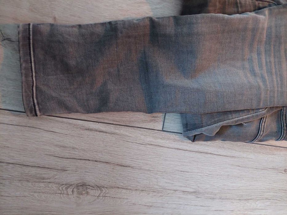 Spodnie jeansowe damskie toxik szare zwężane rozciągliwe rozmiar 38