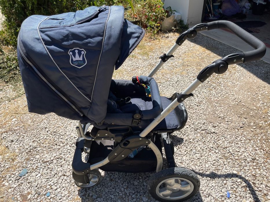 Carrinho de bebé com alcofa