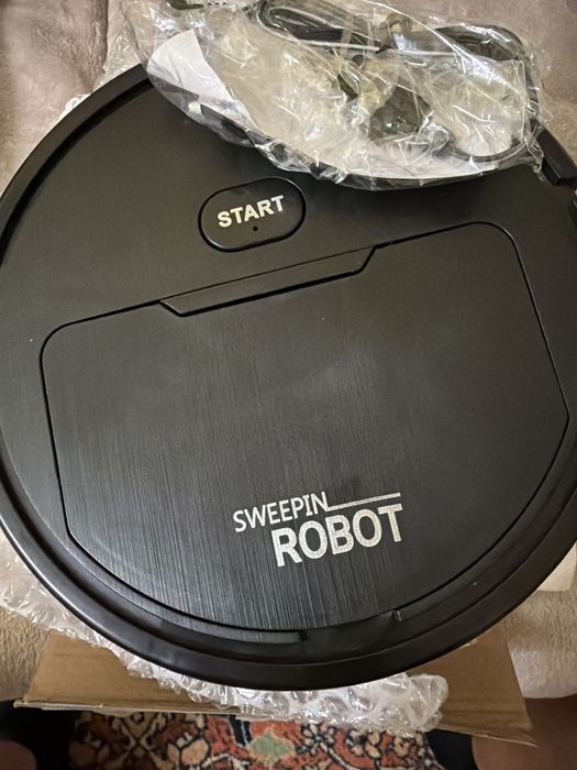 Zamiatarka. Odkurzacz. Mini. Mini robot. Robit.