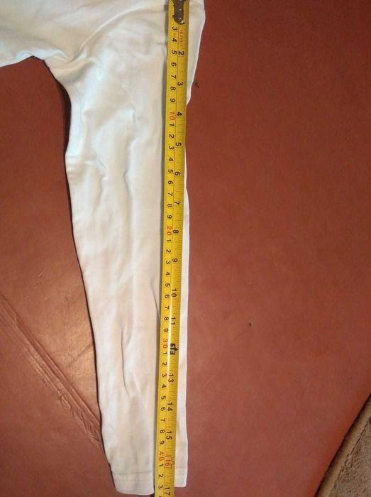 Білий гольф для дівчинки