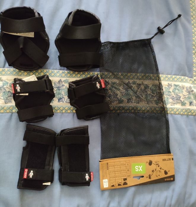 Conjunto proteções Oxelo pretas tamanho XS