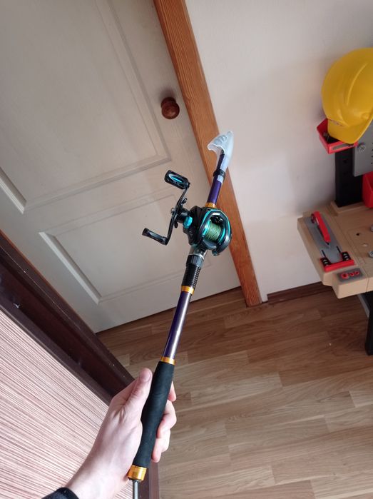 Новый спиннинг 1.8м с мультипликаторной катушкой.