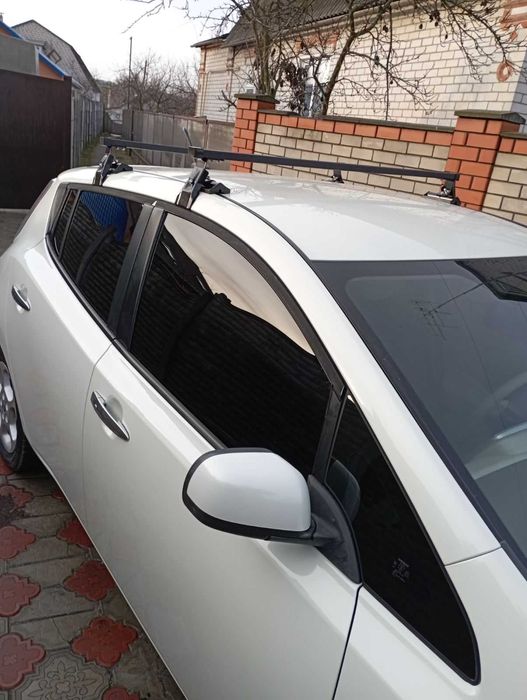Стальные поперечины TD9-K8 на гладкую крышу Nissan leaf