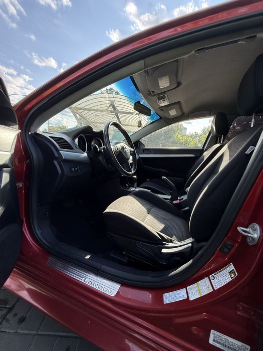 Lancer 10 2011 2.0 автомат / газ