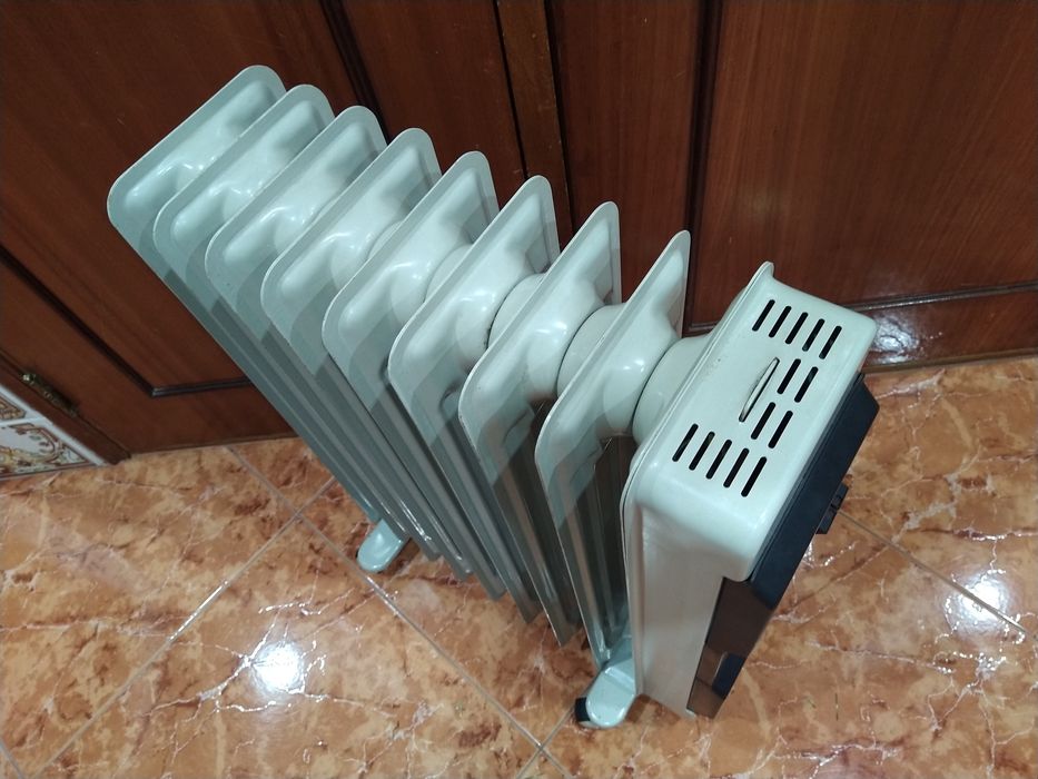 Aquecedor radiador a óleo  casa quarto apartamento vivenda escritório gabinete cozinha.