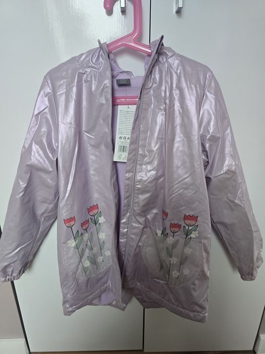 Płaszcz przeciwdeszczowy. Nowy z metką  rozmiar 134