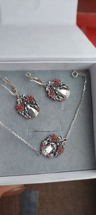 Срібна підвіска "Лялька- мотанка в калині"