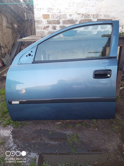 Двері Опель Астра G