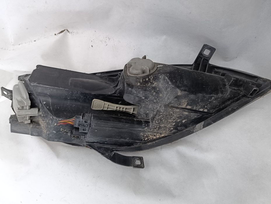 Mitsubishi Colt VI 6 lampa przednia lewa AL
