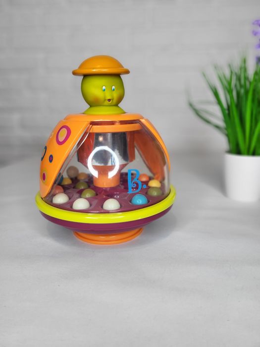 Іграшка дзиґа-мандаринка Battat