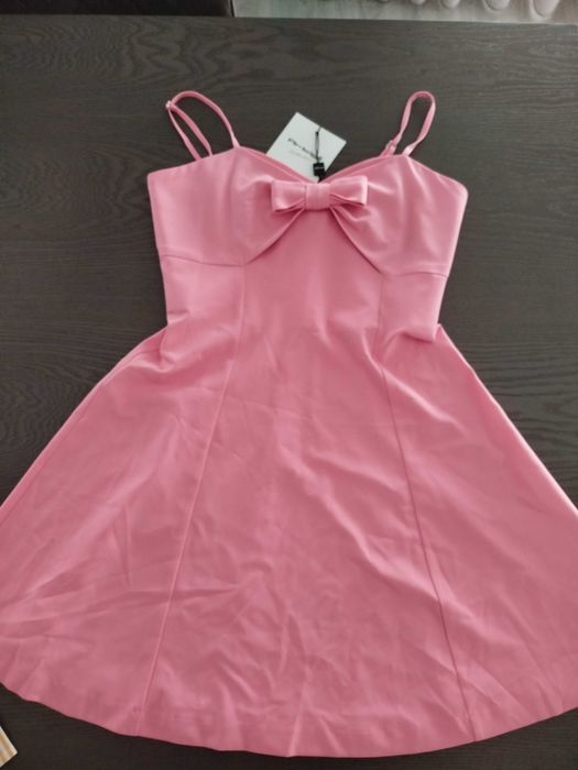 10 vestidos novos de marca 22.50€...