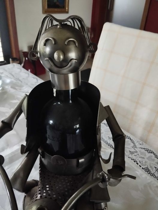 Suporte de garrafa em metal