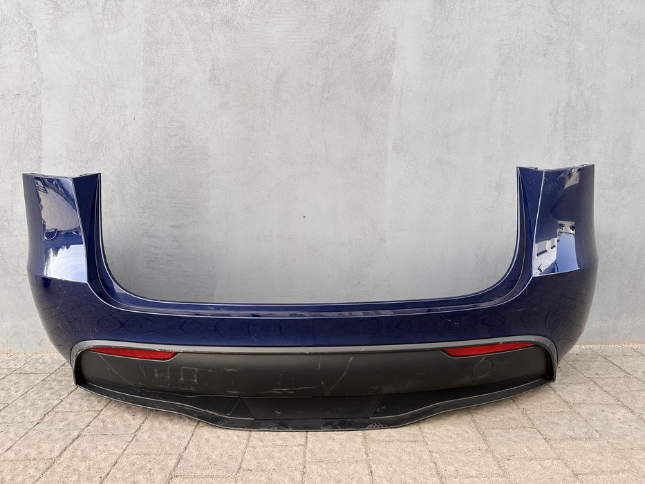 Tesla Model Y 2023+ бампер задній в зборі оригінал Тесла запчастини