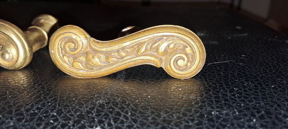 Klamki  mosiężne .