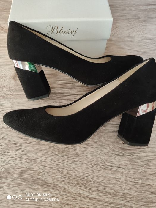 Buty na słupku Błażej