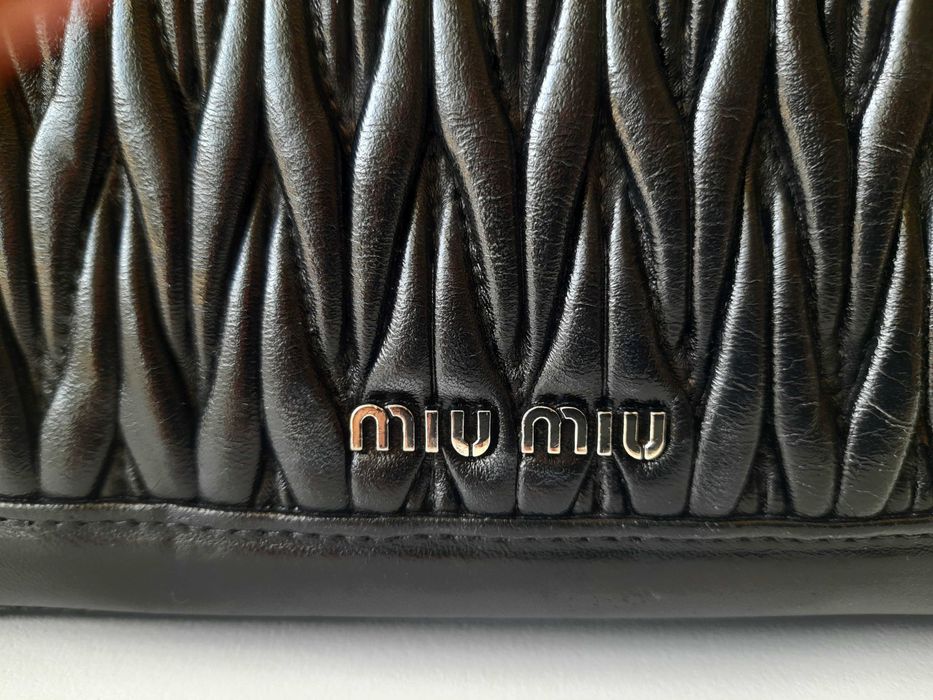 Mala Miu Miu muito bom