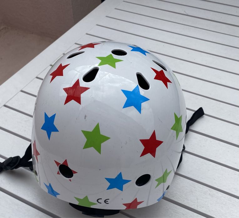 Caparece de bicicleta para crianca