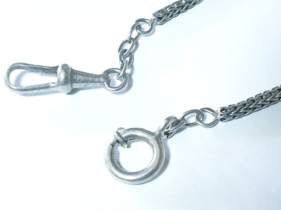 Antigo corrente de relógio de bolso em prata contrastada