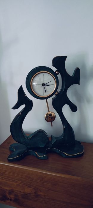 Relógio com pêndulo