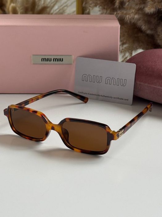 Сонячні окуляри miu miu