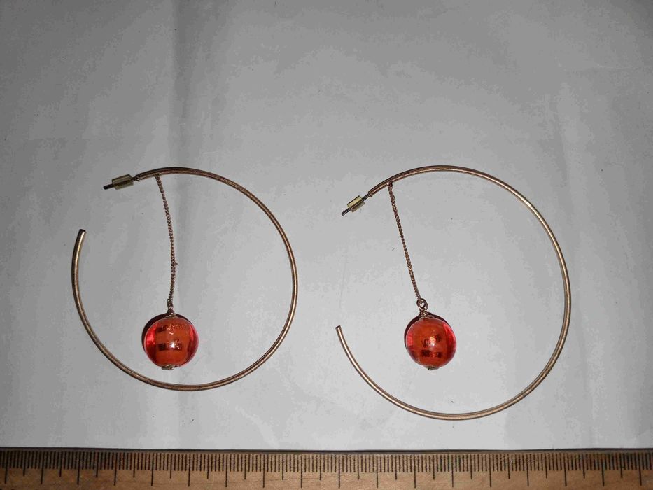 Винтажные сереги-кисточек в форме крупных полукруглых колец.