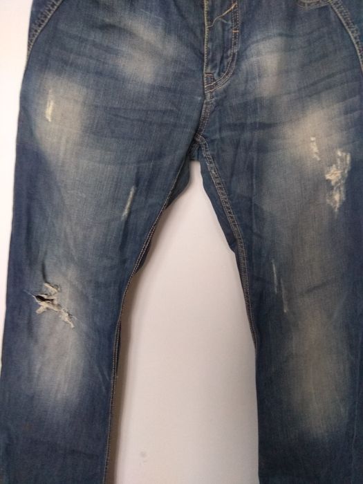 Spodnie jeansowe Cropp 32/32,przecierane z dziurami