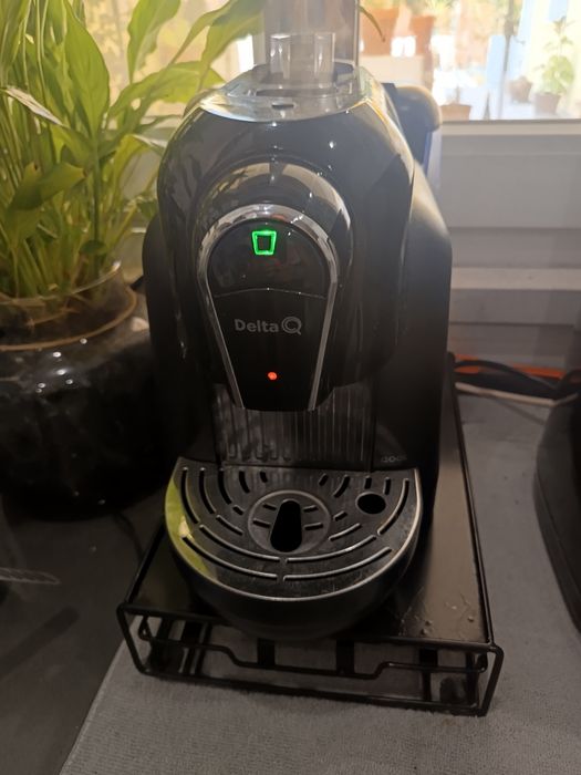 Máquina de café Delta com suporte para cápsulas