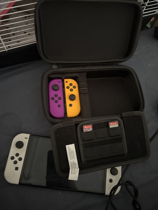 Nintendo Switch OLED biały + gry + joycony+karta 128 GB+dock