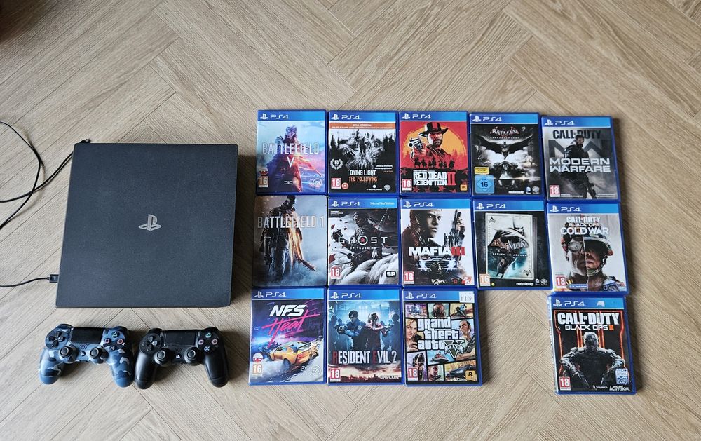 PS4 Slim 1TB + 2 pady + popularne gry