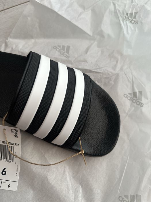 Нові шльопанці унісекс adidas 38,5 розмір 25 см