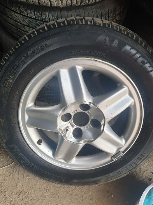 Oryginalne Alufelgi Opel 15 Komplet 4 szt. + Dekielki