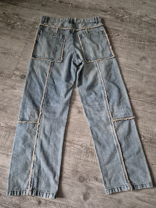Luźne spodnie jeansy baggy Bershka M