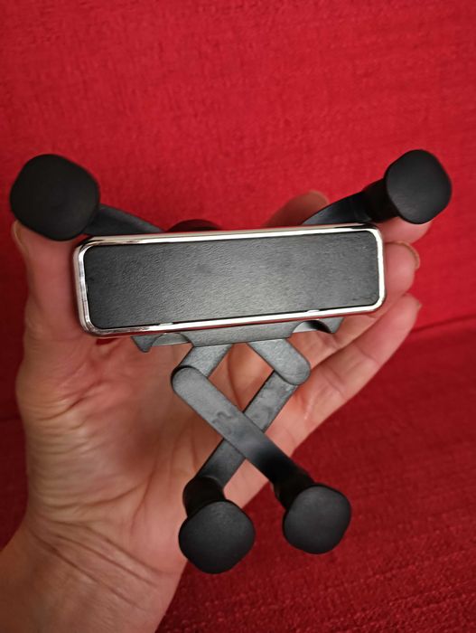 Suporte manual ajustável de telemóvel para viatura