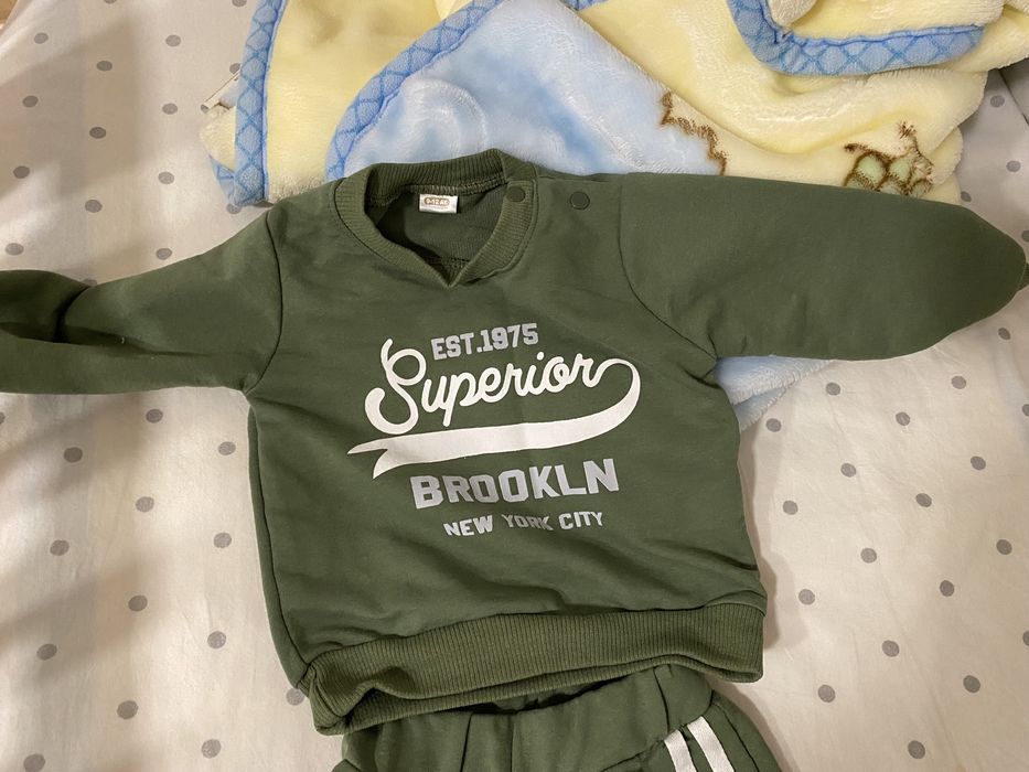 Костюм новий