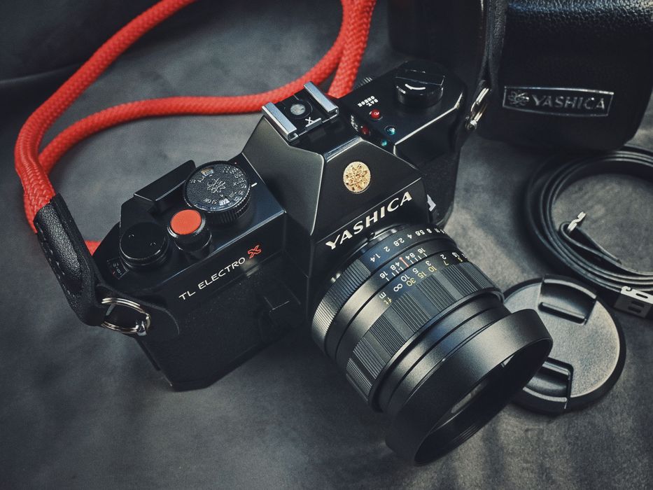 Legendarna YASHICA TL Electro X ITS 1.4/50mm + osłona, przycisk, pasek