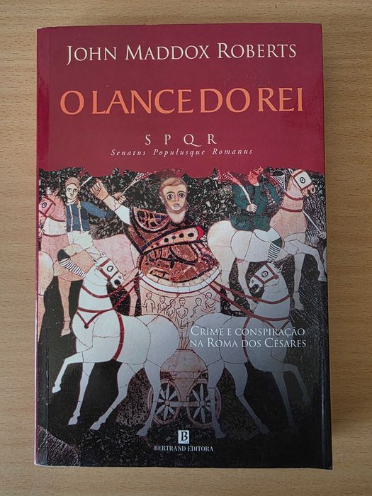Livro "O Lance do Rei" de John Maddox Roberts