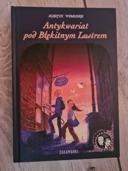 Książka Antykwariat pod błękitnym lustrem Martin Widmark