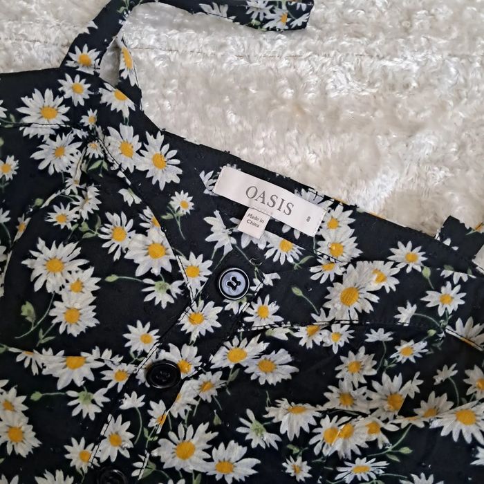 Блуза в ромашки.