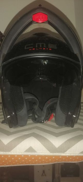 Vende se casaco de moto e capacete