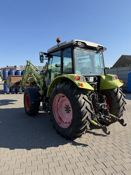 Claas Axos 330 z ładowaczem